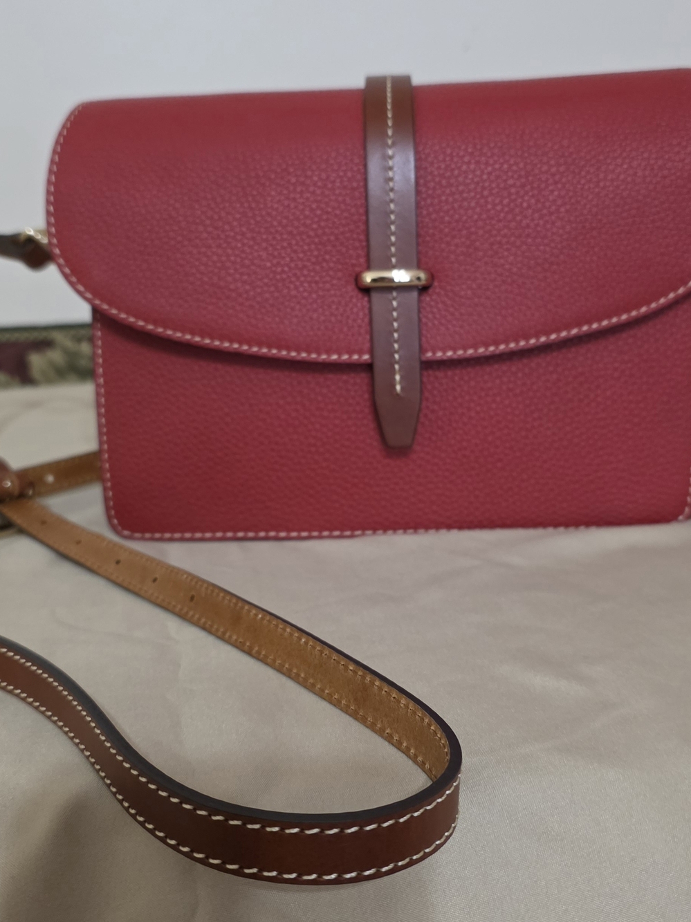 Dooney And Bourke Women's Pebbled Leather Crossbody Bag in Red with Brown Strap